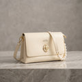 Classic Cream Flap Shoulder Bag with Pearl Accent & Gold Hardware