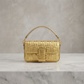 Monogram Embossed Baguette Shoulder Bag with Safety Pin Accent