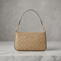 Classic Signature Shoulder Bag – Chic, Compact & Timeless